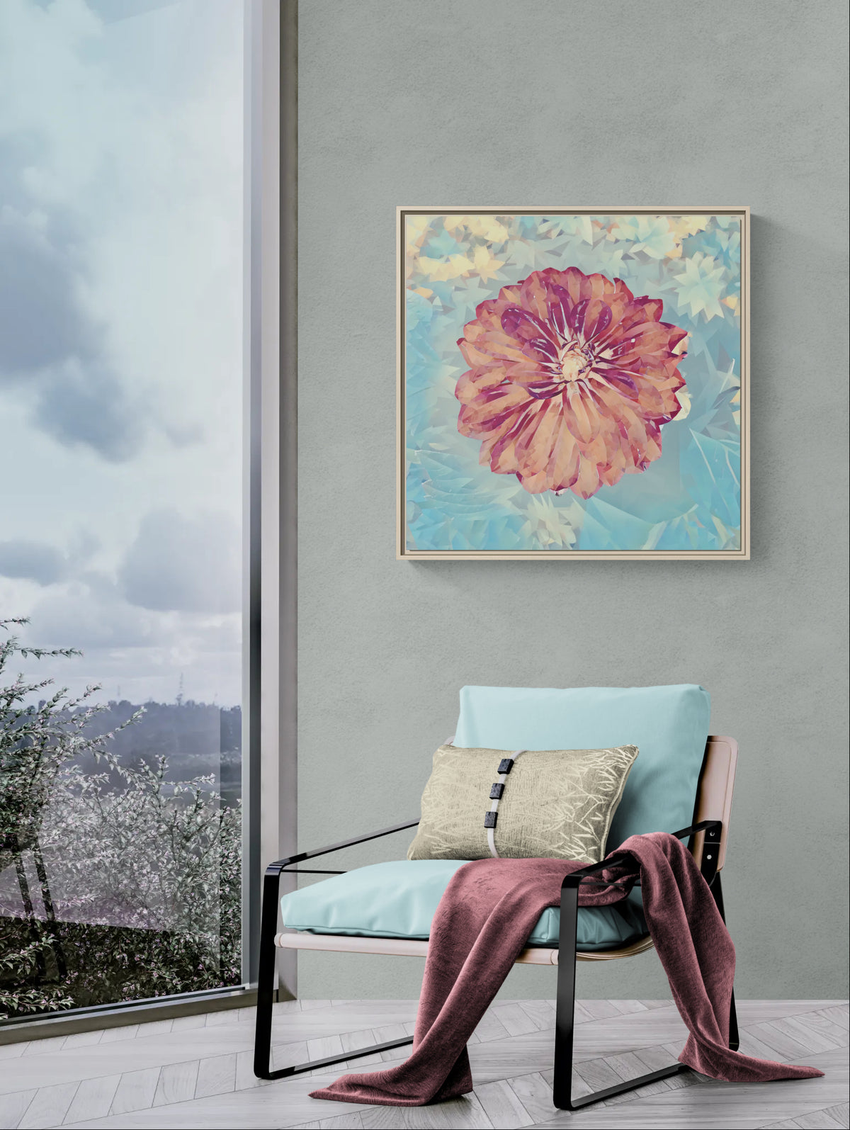 Abstract floral wall art hanging above a light blue armchair with a throw blanket