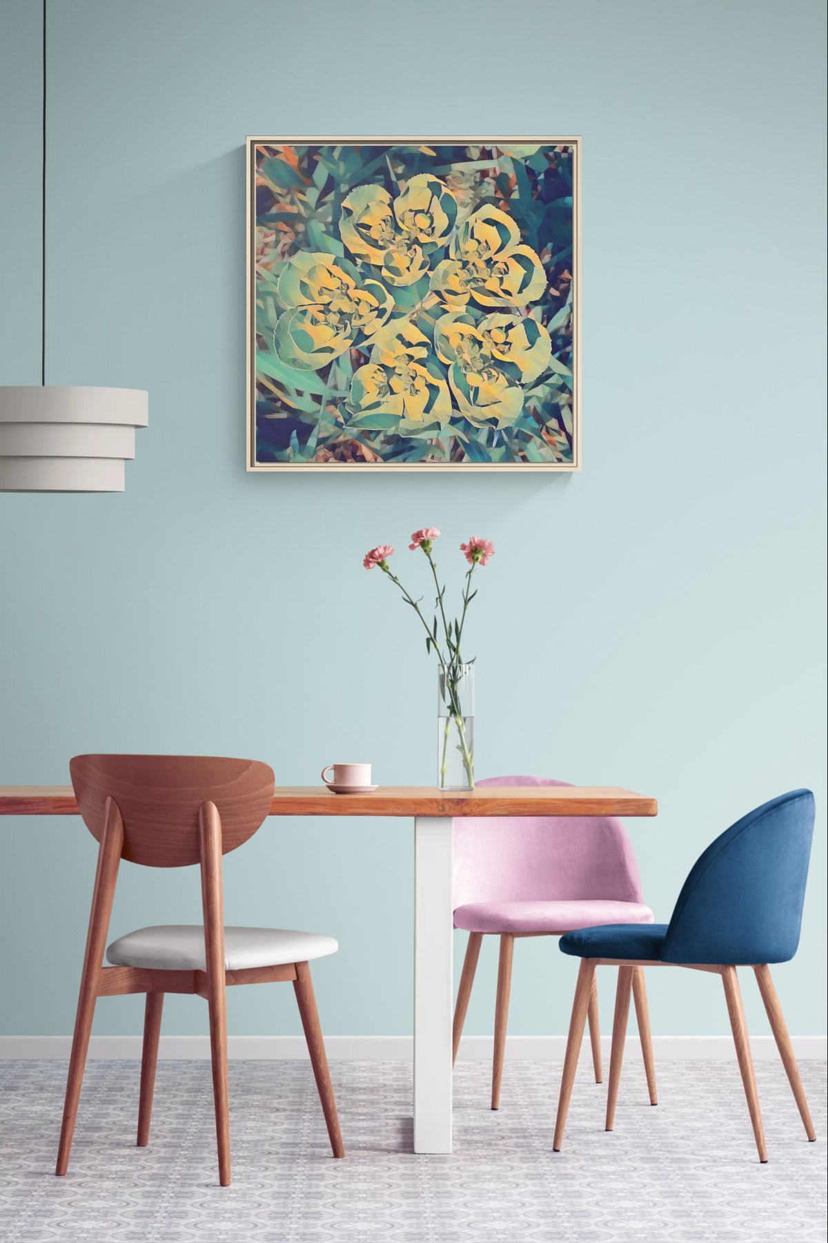 Abstract floral wall art hanging above a dining table with three chairs and a vase of flowers