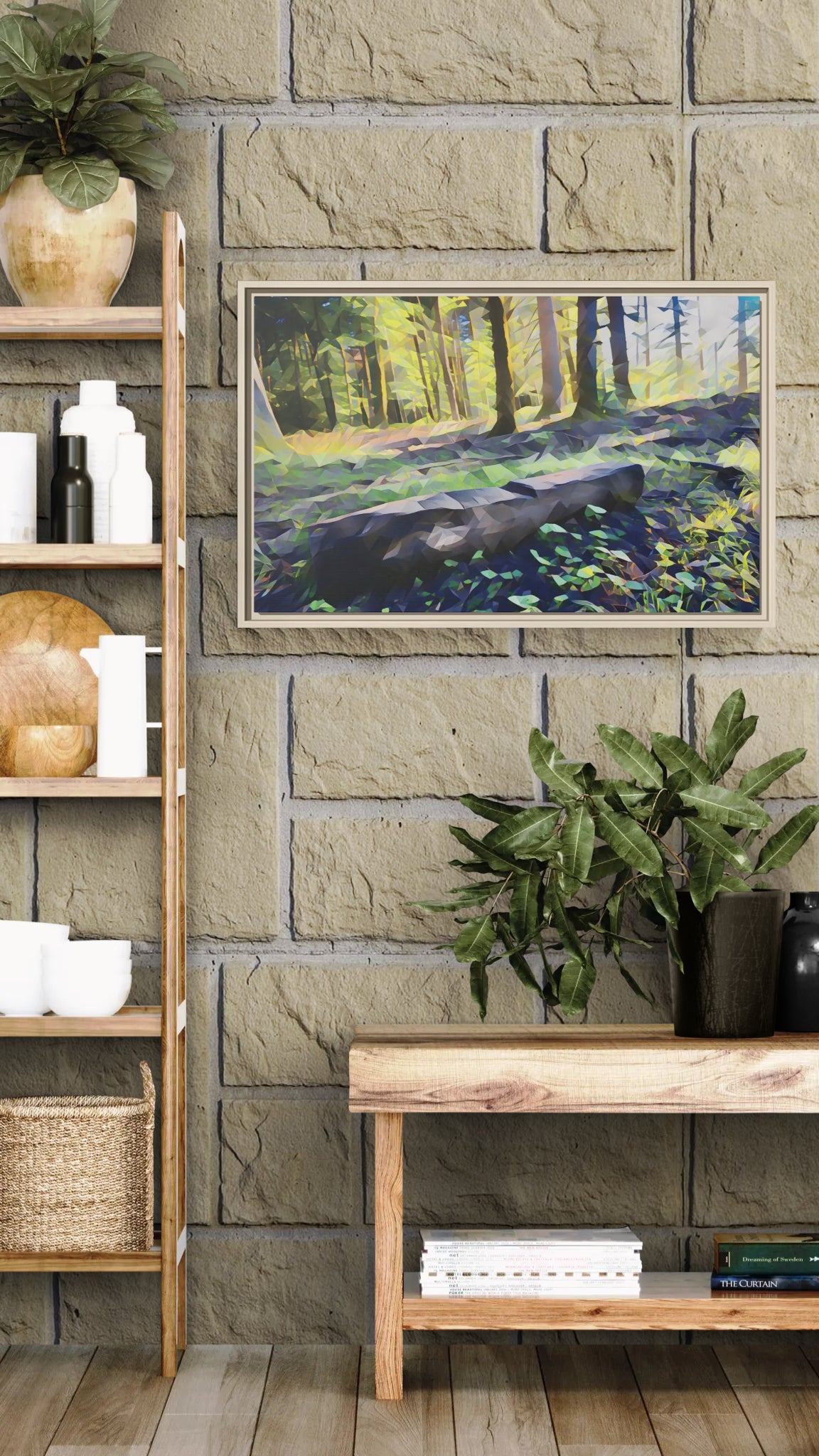 Framed geometric forest landscape art print hanging on a stone wall above a wooden console table