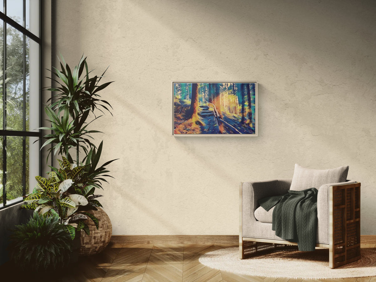 Framed forest landscape art print hanging on a beige wall above an armchair and potted plant