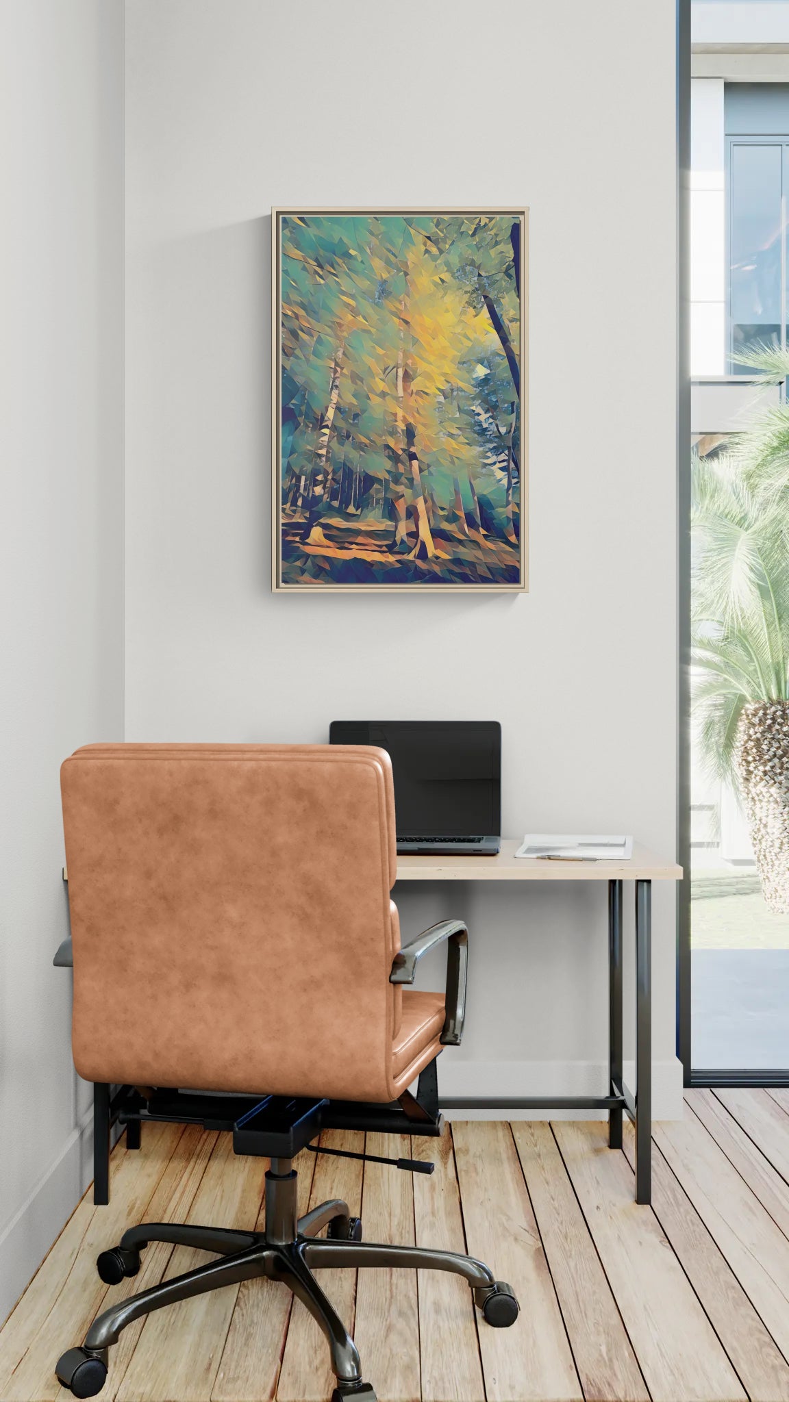 Abstract forest wall art hanging above a desk with a laptop and leather office chair