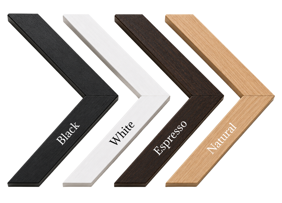 Four chevron-shaped picture frame samples arranged diagonally on a white background, labeled Black, White, Espresso, and Natural.