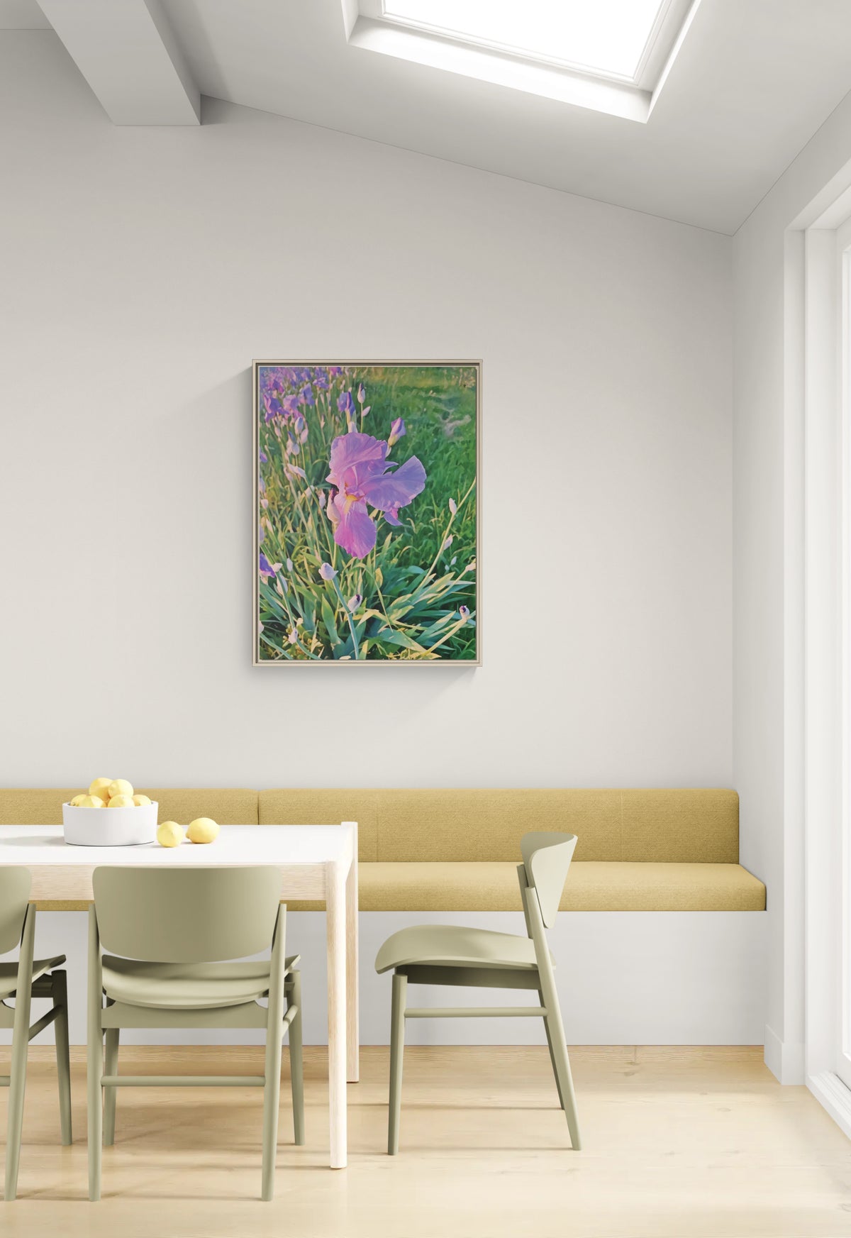 Framed wall art of a purple iris flower in a garden hanging above a dining nook
