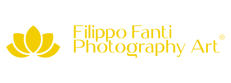 Logo of Filippo Fanti Photography Art with a yellow lotus flower design 