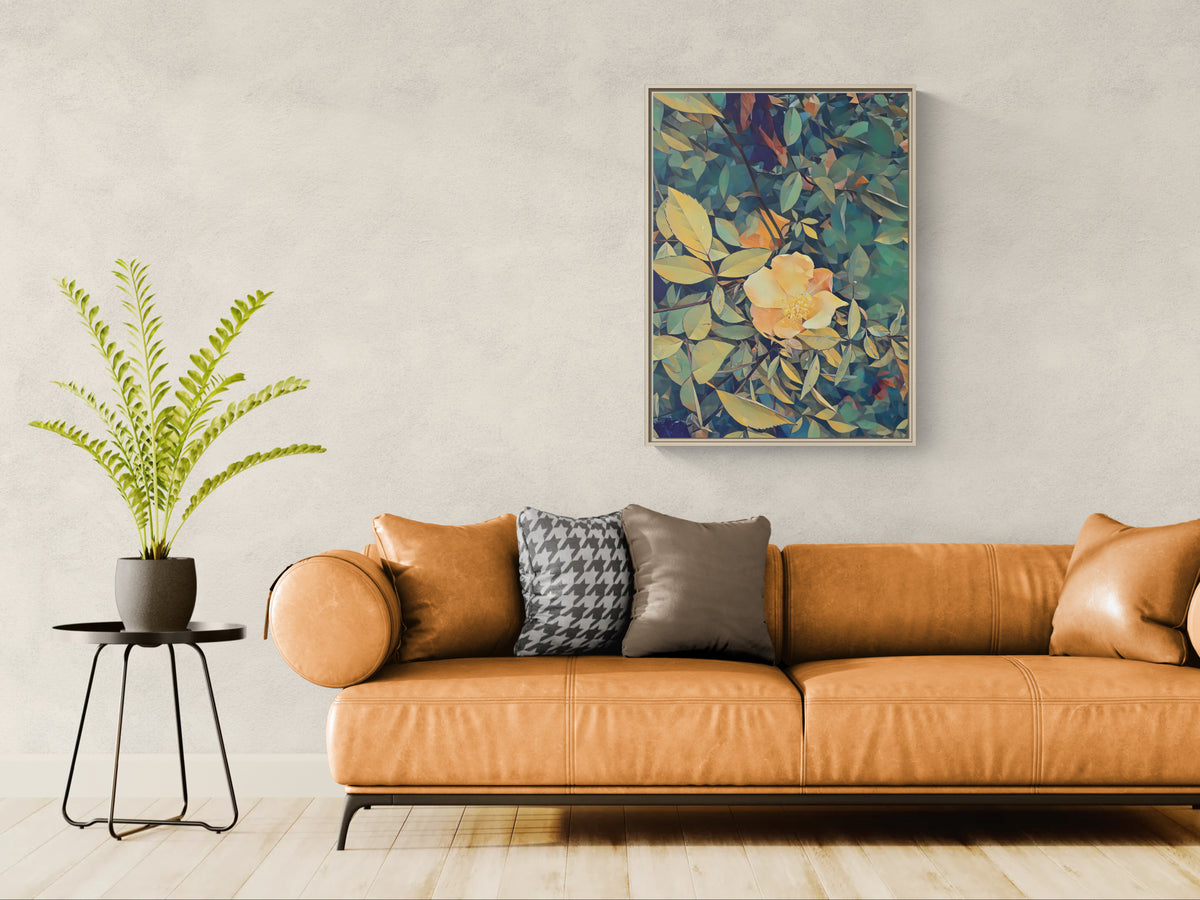 Framed floral wall art above a tan leather sofa with a potted fern on a side table